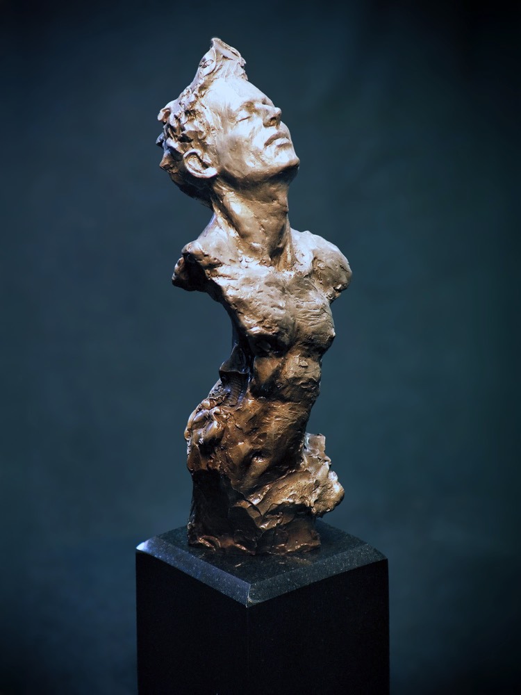 Relax male torso and bust figurative bronze sculpture on dark granite\ pedestal by Richard Becker